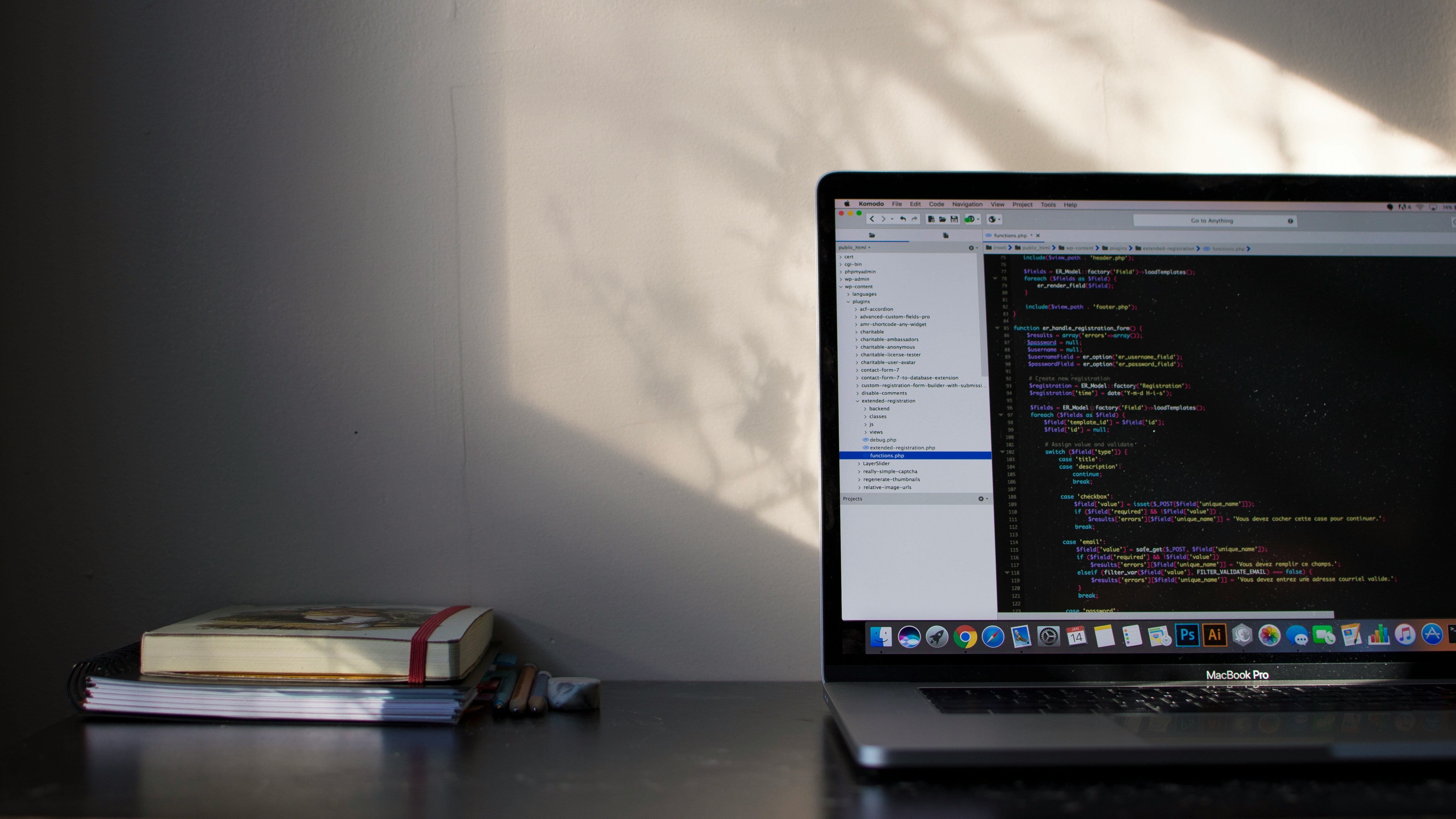 Software development resources beside a coding workspace